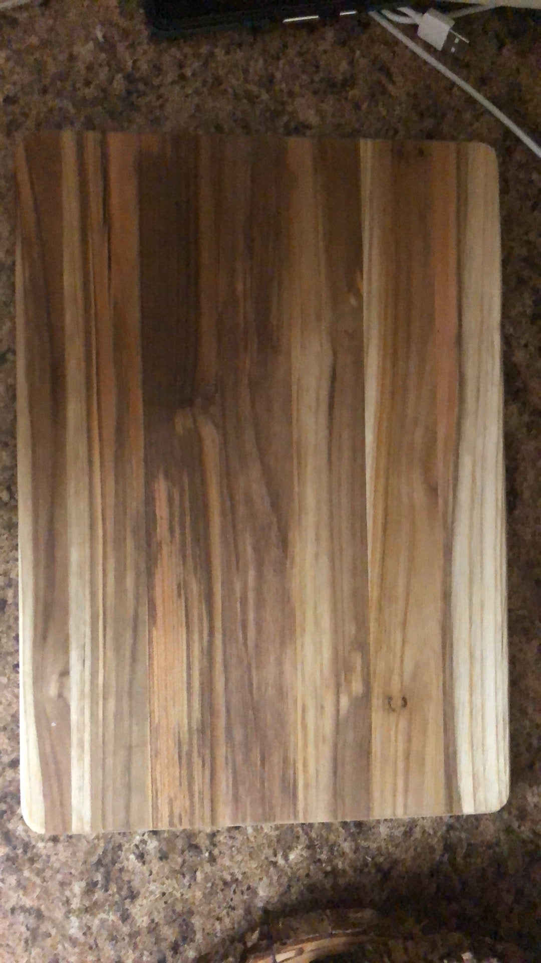 Blank teak charcuterie board showing natural wood grain