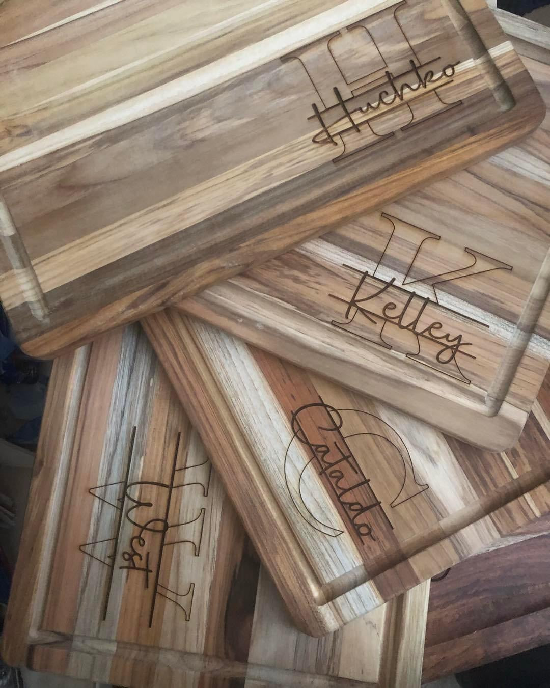 Personalized charcuterie boards with custom engraved monogram designs